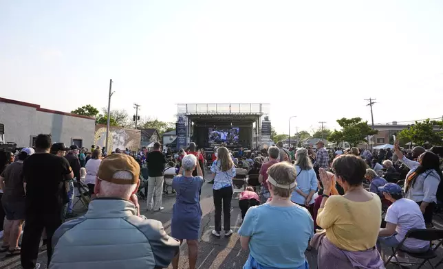People attend a concert at George Floyd Square on the five-year anniversary of Floyd's death, Sunday, May 25, 2025, in Minneapolis. (AP Photo/Abbie Parr)