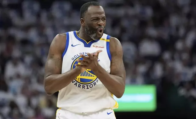 Golden State Warriors forward Draymond Green (23) reacts after missing a shot during the first half of Game 2 of an NBA basketball second-round playoff series against the Minnesota Timberwolves, Thursday, May 8, 2025, in Minneapolis. (AP Photo/Abbie Parr)