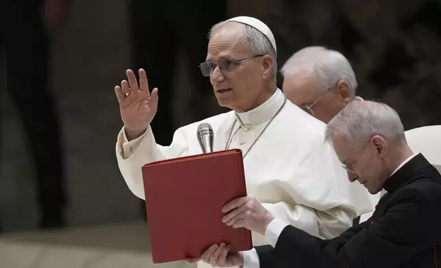 Pope Leo XIV meets members of the international media in the Paul VI Hall at the Vatican, Tuesday, May 13, 2025. (AP Photo/Domenico Stinellis)