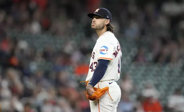 Houston Astros starting pitcher Lance McCullers Jr. reacts after Athletics' Jacob Wilson's home run during the fifth inning of a baseball game, Wednesday, May 28, 2025, in Houston. (AP Photo/Karen Warren)