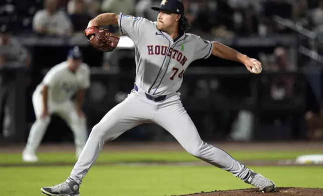 Houston Astros pitcher Bryan King delivers to the Tampa Bay Rays during the sixth inning of a baseball game Monday, May 19, 2025, in Tampa, Fla. (AP Photo/Chris O'Meara)
