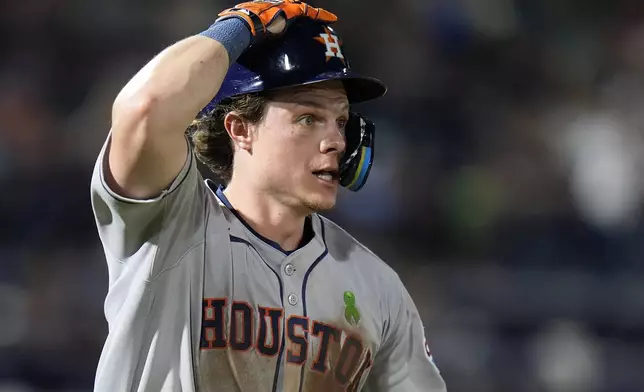 Houston Astros' Jake Meyers watches his solo home run off Tampa Bay Rays pitcher Manuel Rodríguez clear the fence during the seventh inning of a baseball game Monday, May 19, 2025, in Tampa, Fla. (AP Photo/Chris O'Meara)