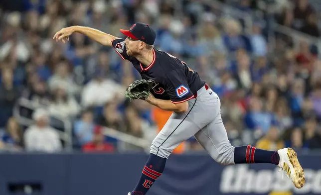 Cleveland Guardians pitcher Tanner Bibee pitches to the Toronto Blue Jays during the first inning of a baseball game in Toronto, Sunday, May 4, 2025. (Frank Gunn/The Canadian Press via AP)