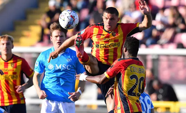 Lecce's Nikola Krstovic kicks the ball during the Italian Serie A soccer match between US Lecce and SSC Napoli, at the Via del Mare Stadium, in Lecce, Italy, Saturday, May 3, 2025. (Giovanni Evangelista/LaPresse via AP)