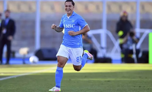 Napoli's Giacomo Raspadori celebrates scoring during the Italian Serie A soccer match between US Lecce and SSC Napoli, at the Via del Mare Stadium, in Lecce, Italy, Saturday, May 3, 2025. (Giovanni Evangelista/LaPresse via AP)