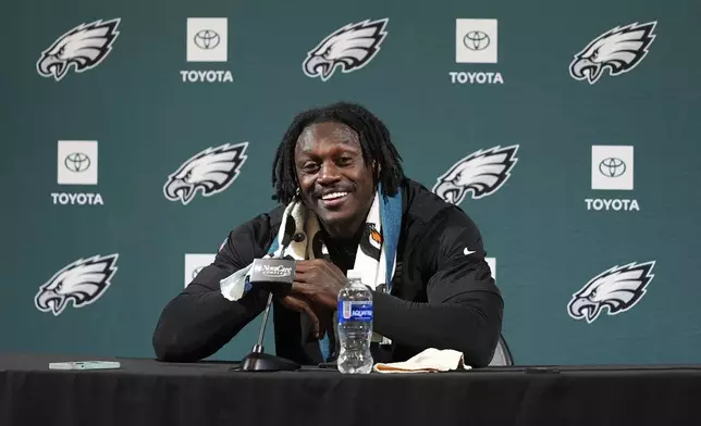 Philadelphia Eagles' A.J. Brown smiles during a news conference at the NFL football team's training facility, Tuesday, May 20, 2025, in Philadelphia. (AP Photo/Matt Slocum)