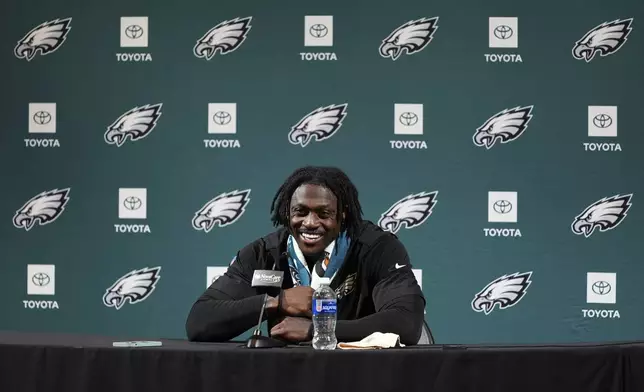 Philadelphia Eagles' A.J. Brown smiles during a news conference at the NFL football team's training facility, Tuesday, May 20, 2025, in Philadelphia. (AP Photo/Matt Slocum)