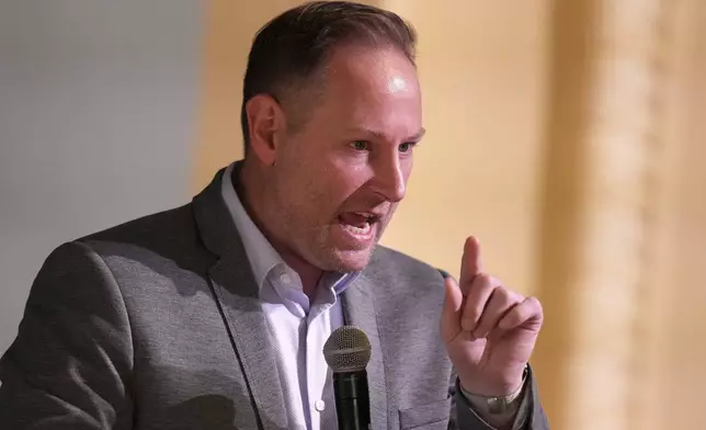 Thomas West, a candidate in the upcoming mayoral primary in Pittsburgh, attends a candidates forum at Perry Traditional Academy in Pittsburgh, Thursday, April 24, 2025. (AP Photo/Gene J. Puskar)
