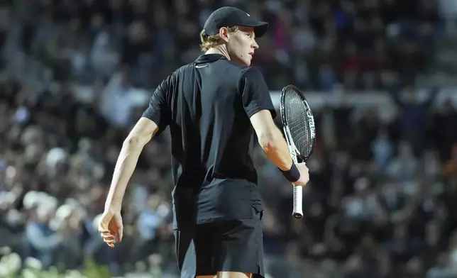 Italy's Jannik Sinner stands on the court during his semifinal tennis match against Tommy Paul, of the United States, at the Italian Open, in Rome, Friday, May 16, 2025. (AP Photo/Andrew Medichini)