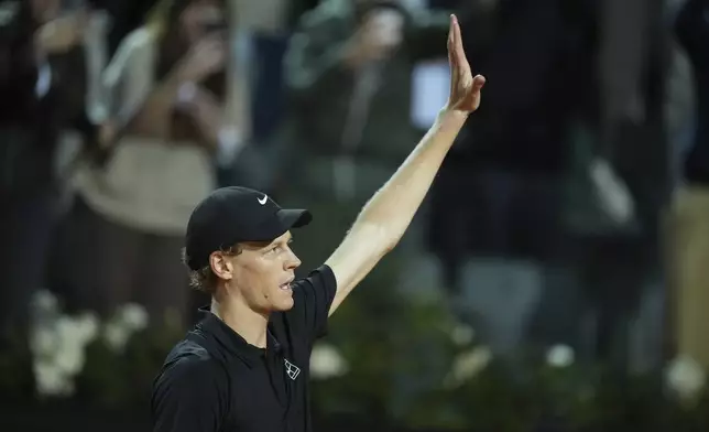 Italy's Jannik Sinner celebrates after winning the semifinal tennis match against Tommy Paul, of the United States, at the Italian Open, in Rome, Friday, May 16, 2025. (AP Photo/Andrew Medichini)