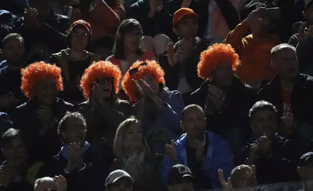 Jannik Sinner fans wait for the start of the semifinal tennis match against Tommy Paul, of the United States, at the Italian Open, in Rome, Friday, May 16, 2025. (AP Photo/Andrew Medichini)