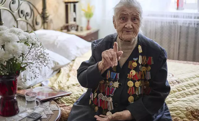 World War II veteran Valentina Efremova, 101, poses for a portrait in Yakutsk, Russia, on Friday, April 18, 2025. Efremova served as a nurse in field hospitals on the front lines. (AP Photo/Roman Kutukov)