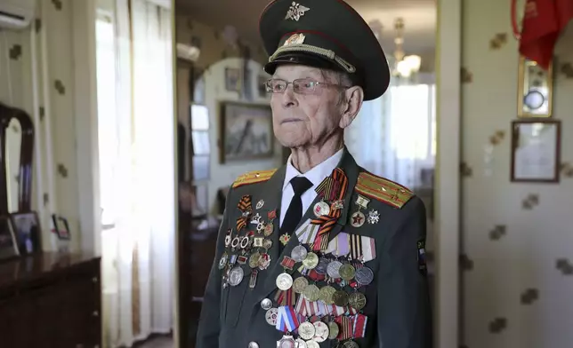 World War II veteran Alexander Medkov poses for a portrait in Volgograd, Russia, on Thursday, May 1, 2025. Medkov was drafted into the Soviet army in 1943 and served as a communications officer. (AP Photo/Alexandr Kulikov)