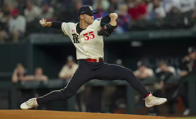 Texas Rangers starting pitcher Jack Leiter throws a pitch to the Seattle Mariners during the first inning of a baseball game Friday, May 2, 2025, in Arlington, Texas. (AP Photo/Julio Cortez)
