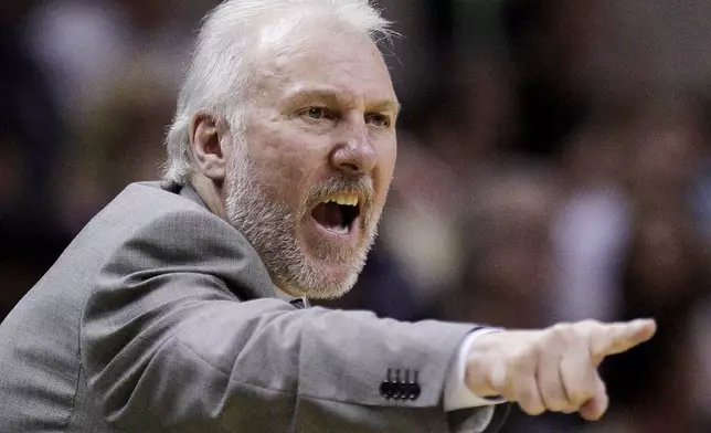 FILE - San Antonio Spurs coach Gregg Popovich directs his team during in the fourth quarter of an NBA basketball game against the New Orleans Hornets in San Antonio, Wednesday, April 15, 2009. (AP Photo/Eric Gay, File)