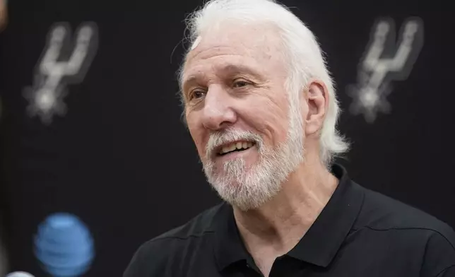 FILE - San Antonio Spurs head coach Gregg Popovich smiles during the NBA basketball team's media day, Monday, Sept. 27, 2021, in San Antonio. (AP Photo/Eric Gay, File)