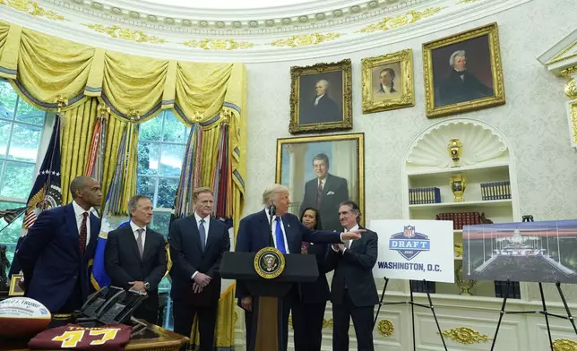 Interior Secretary Doug Burgum, from right, District of Columbia Mayor Muriel Bowser, and from left, Secretary of Housing and Urban Development Scott Turner, Washington Commanders owner Josh Harris and NFL Commissioner Roger Goodell listen as President Donald Trump speaks during an event to announce that the 2027 NFL Draft will be held on the National Mall, in the Oval Office of the White House, Monday, May 5, 2025, in Washington. (AP Photo/Alex Brandon)