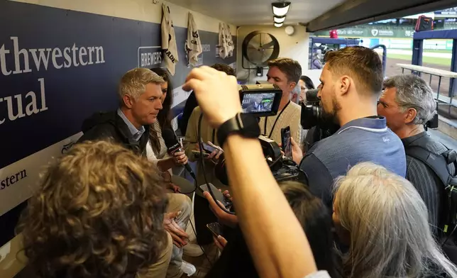 Mike Elias, executive vice president and general manager for the Baltimore Orioles, speaks to the media before a baseball game against the Milwaukee Brewers, Tuesday, May 20, 2025, in Milwaukee. (AP Photo/Aaron Gash)