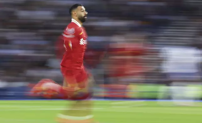 Liverpool's Mohamed Salah in action during the English Premier League soccer match between Brighton and Liverpool at American Express Stadium in Brighton, England, Monday, May 19, 2025. (AP Photo/Ian Walton)