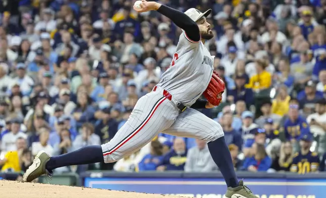 Minnesota Twins starting pitcher Pablo Lopez throws to the Milwaukee Brewers during the first inning of a baseball game, Saturday May 17, 2025, in Milwaukee. (AP Photo/Jeffrey Phelps)
