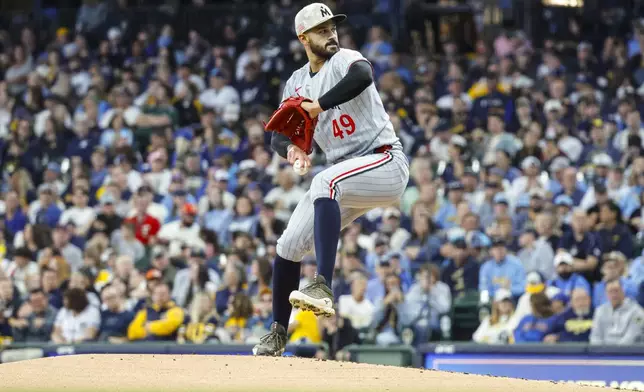 Minnesota Twins starting pitcher Pablo Lopez throws to the Milwaukee Brewers during the first inning of a baseball game, Saturday May 17, 2025, in Milwaukee. (AP Photo/Jeffrey Phelps)