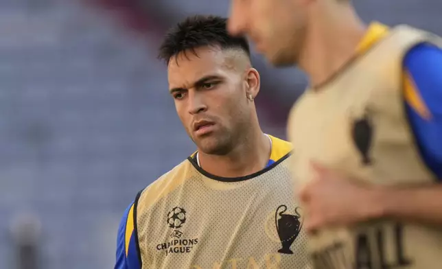 Inter Milan's Lautaro Martinez looks during a training session ahead of the Champions League final soccer match between Paris Saint-Germain and Inter Milan in Munich, Germany, Friday, May 30, 2025. (AP Photo/Luca Bruno)