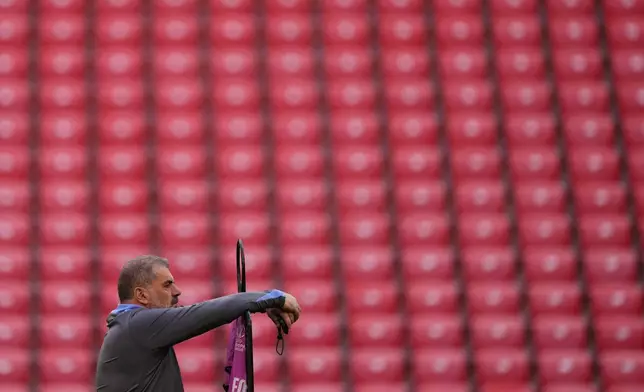 Tottenham's head coach Ange Postecoglou during a training session ahead of the Europa League final soccer match against Manchester United at the San Mames Stadium in Bilbao, Spain, Tuesday, May 20, 2025. (AP Photo/Manu Fernandez)