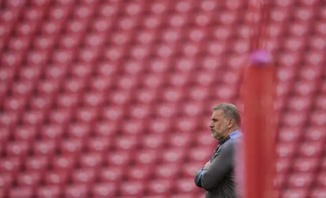 Tottenham's head coach Ange Postecoglou gestures during a training session ahead of the Europa League final soccer match against Manchester United at the San Mames Stadium in Bilbao, Spain, Tuesday, May 20, 2025. (AP Photo/Manu Fernandez)