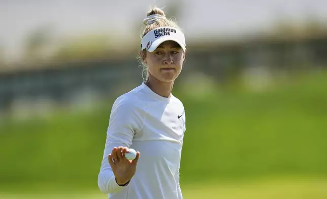 Nelly Korda reacts after finishing on the 18th green during the final round of the Mizuho Americas Open LPGA golf tournament, Sunday, May 11, 2025, in Jersey City, N.J. (AP Photo/Seth Wenig)