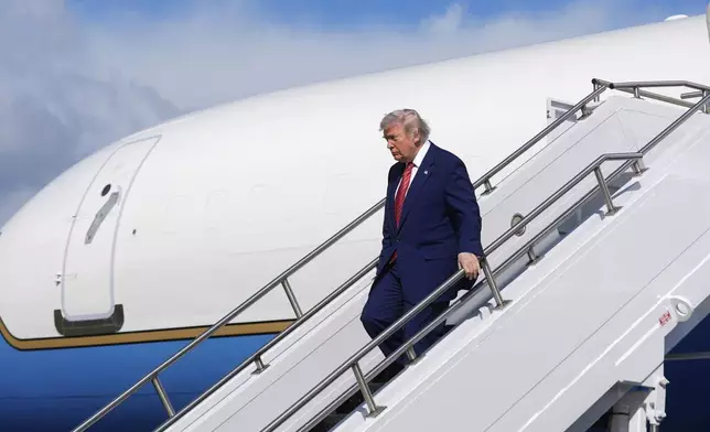 President Donald Trump arrives on Air Force One at Morristown Municipal Airport in Morristown, N.J., Friday, May 23, 2025. (AP Photo/Manuel Balce Ceneta)