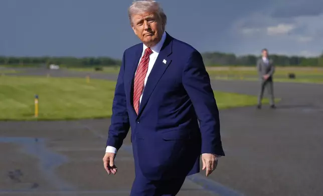 President Donald Trump arrives on Air Force One at Morristown Municipal Airport in Morristown, N.J., Friday, May 23, 2025. (AP Photo/Manuel Balce Ceneta)