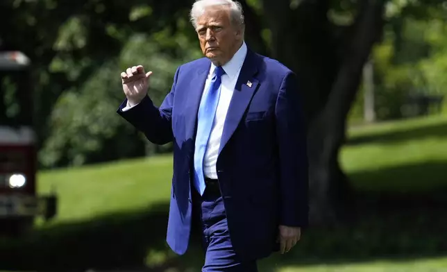 President Donald Trump walks across the South Lawn of the White House to board Marine One en route to Joint Base Andrews, Md., to begin a trip to the Middle East, Monday, May 12, 2025, in Washington. (AP Photo/Mark Schiefelbein)