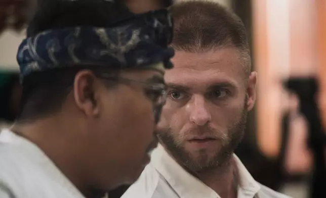 British citizen Thomas Parker sits on the defendant's chair before being sentenced for drug offenses, in Denpasar in Bali, Indonesia, Tuesday, May 27, 2025. (AP Photo/Firdia Lisnawati)