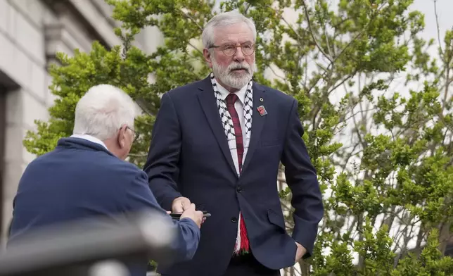 Former Sinn Fein president Gerry Adams outside the High Court in Dublin, Friday, May 30, 2025, where he is bringing a legal action against the BBC over allegations about the murder of an MI5 spy. (Brian Lawless/PA via AP)