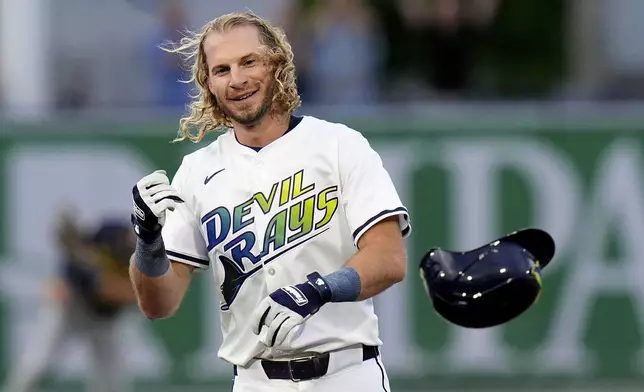 Tampa Bay Rays' Travis Jankowski celebrates after his walkoff hit off Milwaukee Brewers pitcher Trevor Megill during the ninth inning of a baseball game Saturday, May 10, 2025, in Tampa, Fla. (AP Photo/Chris O'Meara)