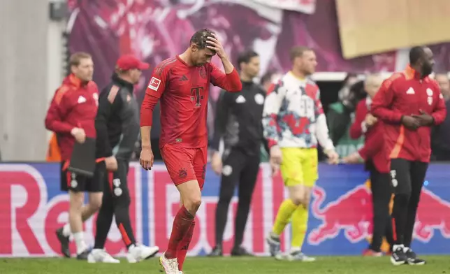 Bayern's Leon Goretzka reacts at the end of the German Bundesliga soccer match between RB Leipzig and FC Bayern Munich at the Red Bull Arena in Leipzig, Germany, Saturday, May 3, 2025. (AP Photo/Matthias Schrader)