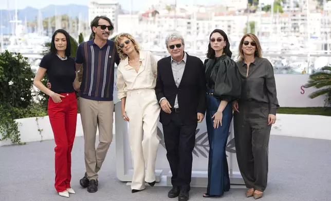 Elodie, from left, Corrado Fortuna, Valeria Golino, Mario Martone, Matilda De Angelis and Ippolita Di Majo pose for photographers at the photo call for the film 'Fuori' at the 78th international film festival, Cannes, southern France, Wednesday, May 21, 2025. (Photo by Lewis Joly/Invision/AP)