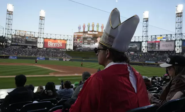 David Hughes of Chicago watches a baseball game between the Chicago White Sox and the Miami Marlins during the fourth inning Friday, May 8, 2025, in Chicago. (AP Photo/David Banks)