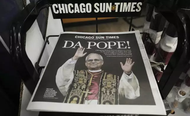 A Chicago Sun-Times newspaper front page shows "DA POPE!" at a grocery store in Mount Prospect, Ill., Thursday, May 9, 2025. (AP Photo/Nam Y. Huh)