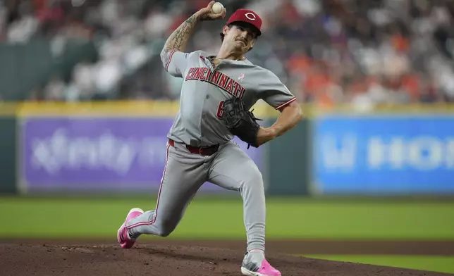 Cincinnati Reds starting pitcher Chase Petty (61) throws during the first inning of a baseball game against the Houston Astros in Houston, Sunday, May 11, 2025. (AP Photo/Ashley Landis)