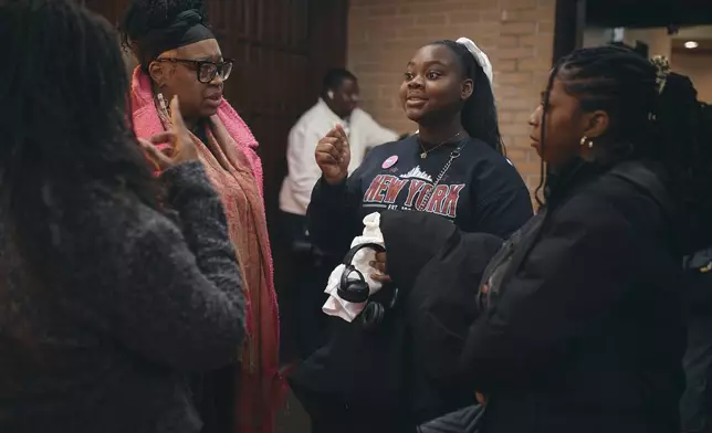 Attendees gather during a Town Hall and voter registration for a school board elections at the Bethany Baptist Church, Saturday, Feb. 1, 2025, in Newark, N.J. (AP Photo/Andres Kudacki)