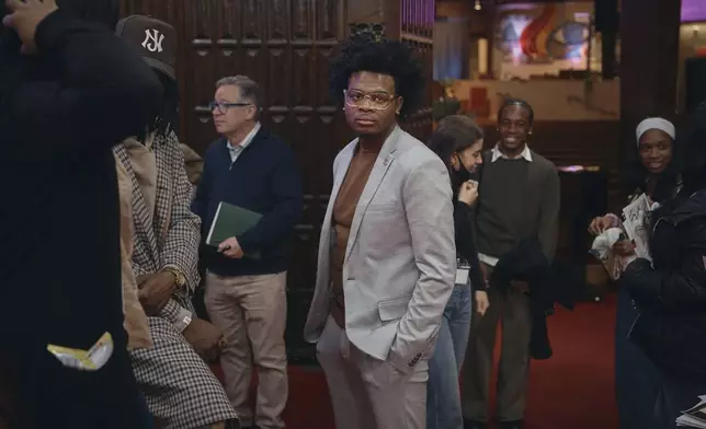 Young Voters Association President, Nathan Duguid, 19, center, stands during a Town Hall and voter registration for school board elections at the Bethany Baptist Church, Saturday, Feb. 1, 2025, in Newark, N.J. (AP Photo/Andres Kudacki)