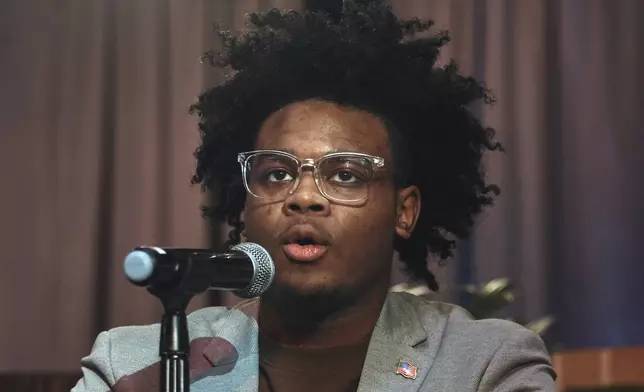 Young Voters Association President, Nathan Duguid, 19, speaks during a Town Hall and voter registration for school board elections at the Bethany Baptist Church, Saturday, Feb. 1, 2025, in Newark, N.J. (AP Photo/Andres Kudacki)