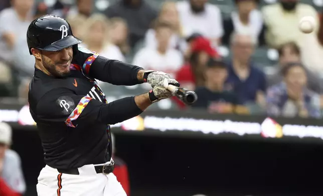 Baltimore Orioles' Ramon Laureano hits a single during the first inning of a baseball game against the Washington Nationals, Friday, May 16, 2025, in Baltimore (AP Photo/Daniel Kucin Jr.)