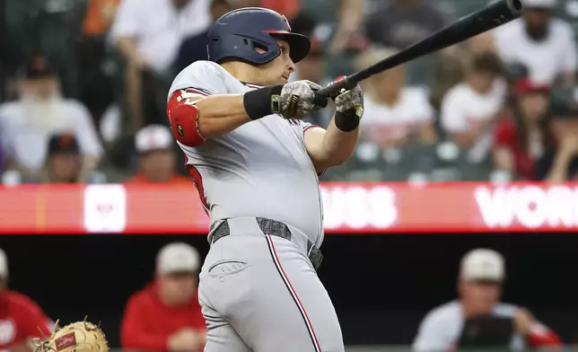 Washington Nationals' Nathaniel Lowe hits a home run during the second inning of a baseball game against the Baltimore Orioles, Friday, May 16, 2025, in Baltimore (AP Photo/Daniel Kucin Jr.)
