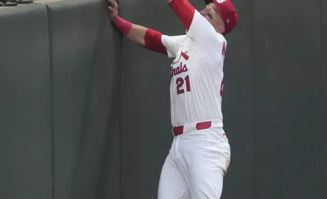St. Louis Cardinals left fielder Lars Nootbaar (21) catches a fly ball by Detroit Tigers' Colt Keith for an out during the fourth inning of a baseball game Monday, May 19, 2025, in St. Louis. (AP Photo/Jeff Roberson)