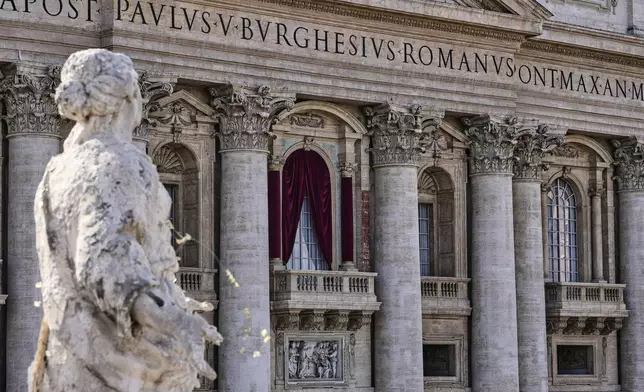 View of the main balcony of the St Peter's Basilica prior to the beginning of the conclave, at the Vatican, Wednesday, May 7, 2025. (AP Photo/Markus Schreiber)