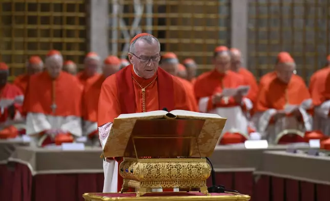 Cardinal Pietro Parolin takes the oath inside the Sistine Chapel at the Vatican at the start of the conclave to elect the successor of late Pope Francis, Wednesday, May 7, 2025. (Vatican Media via AP)