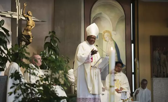 Cardinal Fridolin Ambongo Besungu celebrates Mass at his titular church, San Gabriele Arcangelo all'Acqua Traversa three days before the conclave to elect the 267th pope of the Roman Catholic Church, in Rome, Sunday, May 4, 2025. (AP Photo/Andrew Medichini)