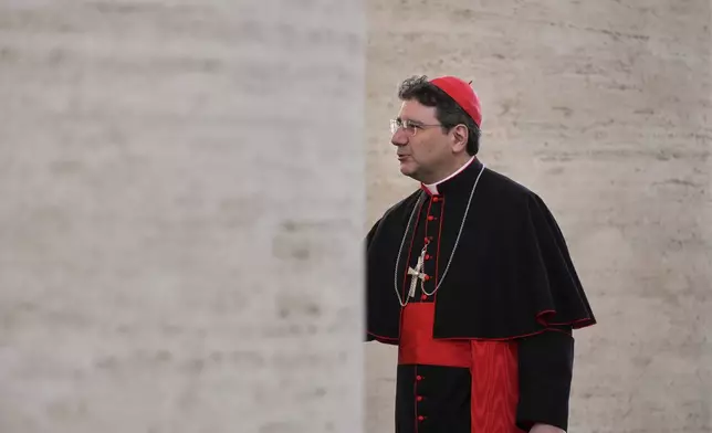 Cardinal Francis Leo leaves the Vatican, Saturday, May 3, 2025, after attending a session of the General Congregation of cardinals in the New Synod Hall where they are preparing for the upcoming conclave starting on May 7, to elect the 267th Roman pontiff. (AP Photo/Andrew Medichini)